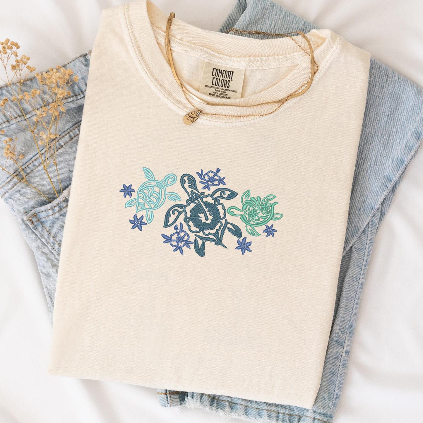 a t - shirt that has a turtle on it