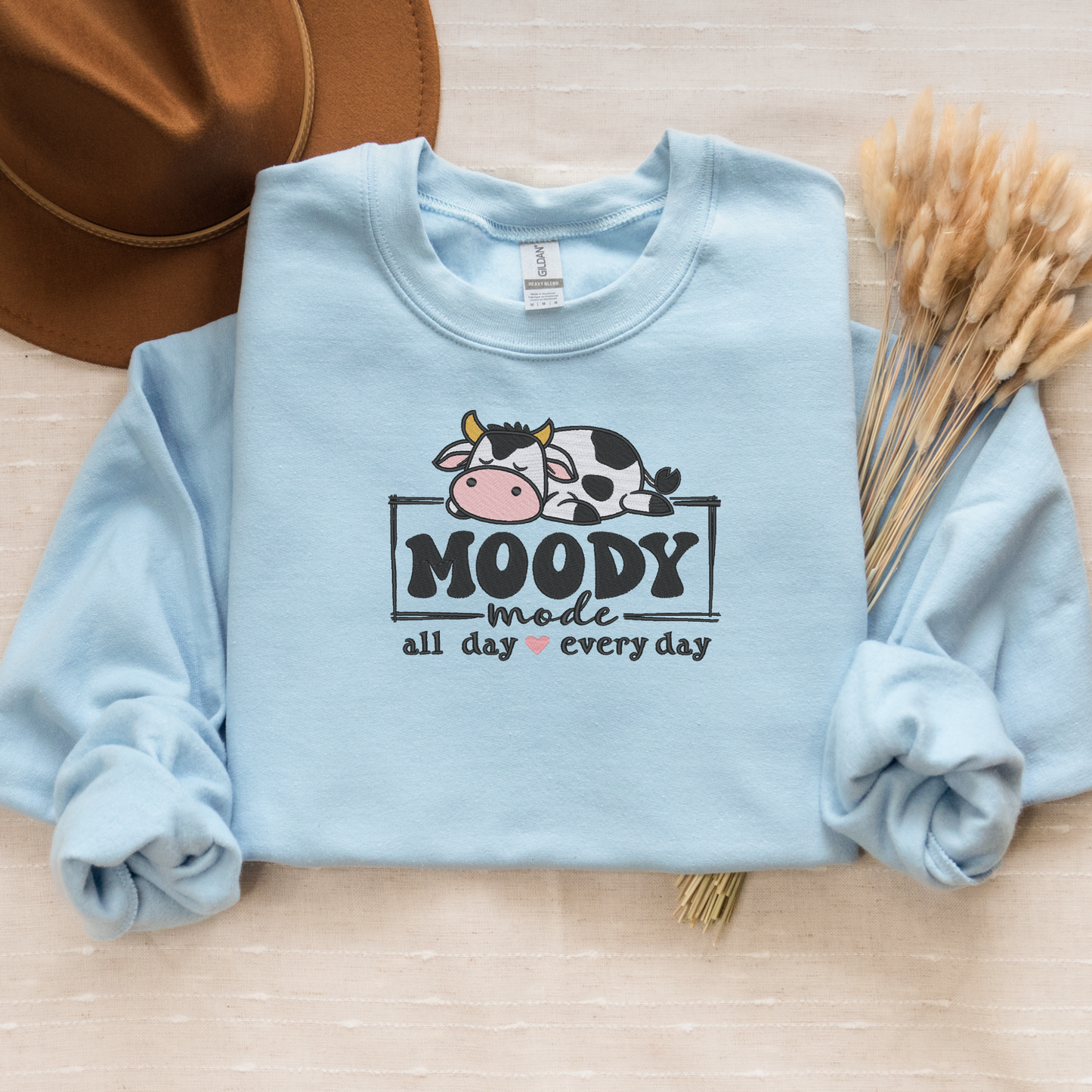 Moody Mode Crewneck Sweatshirt | Cute Lazy Cow Embroidered Design