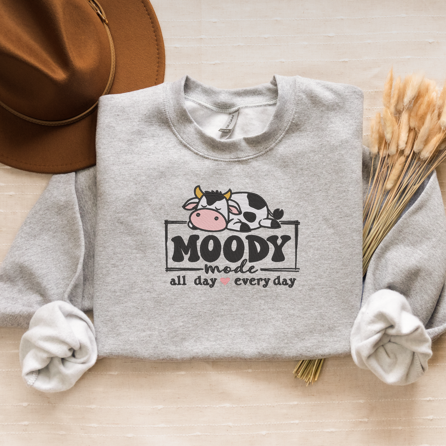 Moody Mode Crewneck Sweatshirt | Cute Lazy Cow Embroidered Design